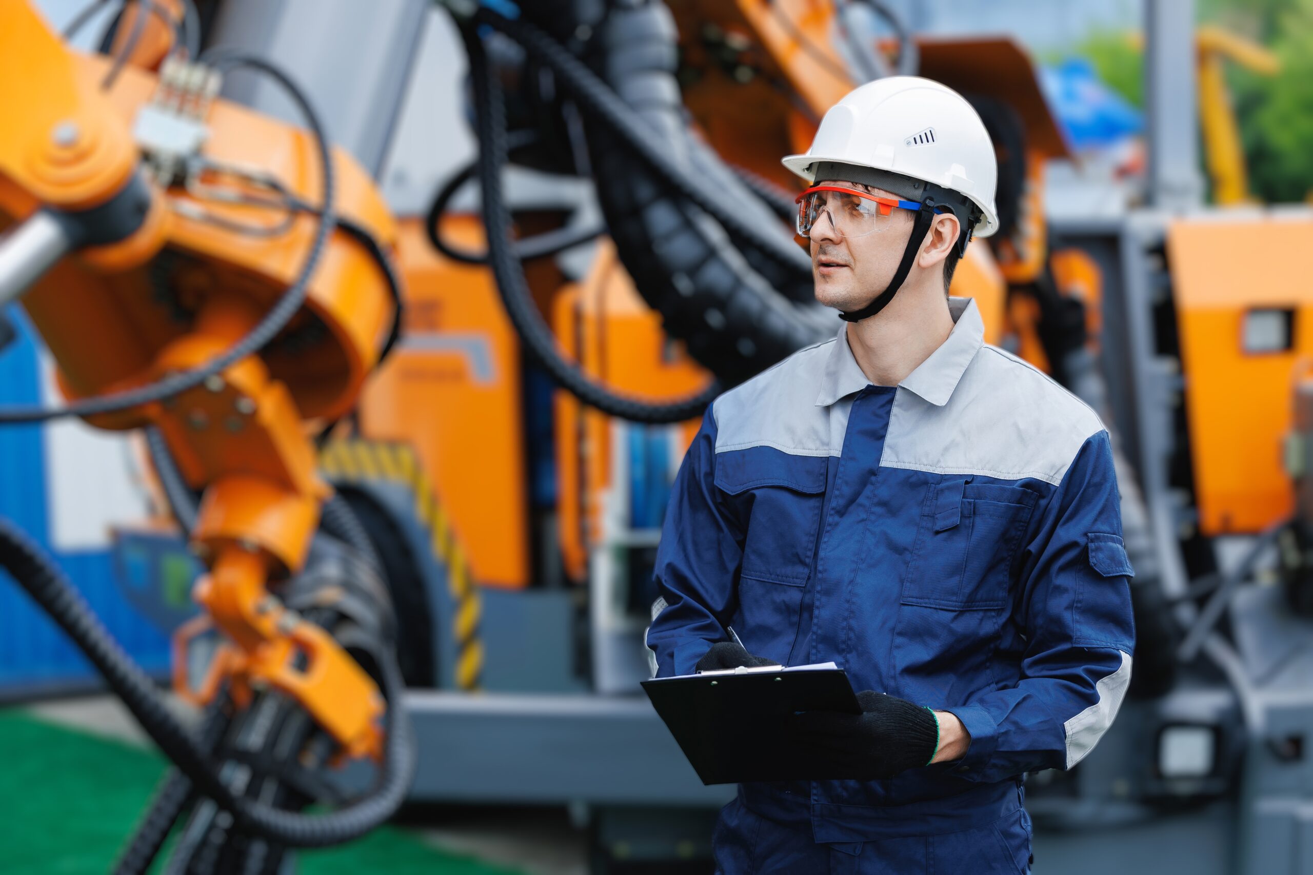 Mechanic,Inspecting,Hydraulic,Hoses,Of,Industrial,Geological,Drilling,Machine,,Mining